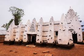 Larabanga Ancient Mosque — Larabanga (near Damongo, southern tip of the region)

 Widely regarded as one of the oldest mosques in West Africa and a masterpiece of Sudano-Sahelian architecture — the same style seen in Mali's famous mosques. Built from mud and wood with distinctive protruding timber beams, it has been in continuous use for centuries and is considered a national monument. It sits just off the road to Mole National Park, making it a natural stop on any northern Ghana itinerary. Note that it's a functioning place of worship, so respectful behavior and appropriate dress are expected.